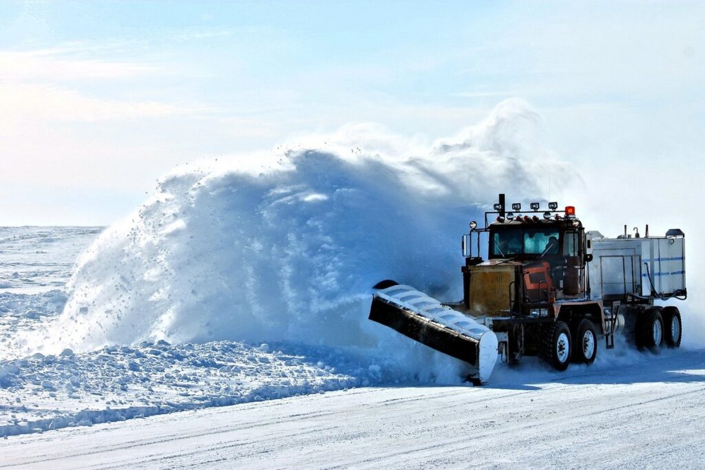 plowing snow with a utv